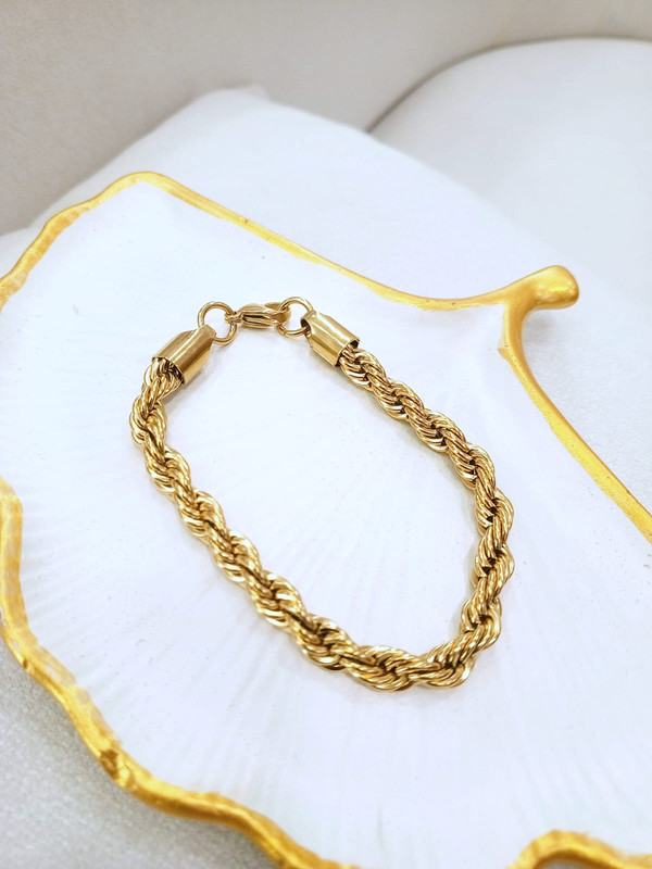 Esclava de acero dorada cordon grueso