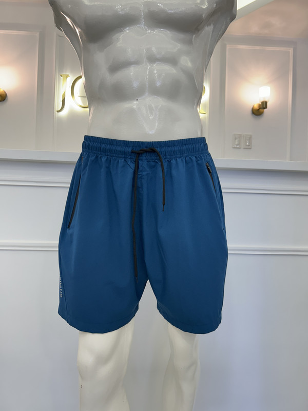 Pantaloneta de hombre deportiva tono azul talla L