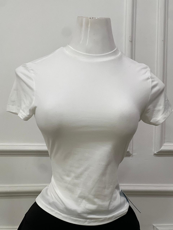 Blusa casual ajustada cuello redondo manga corta color blanco talla S