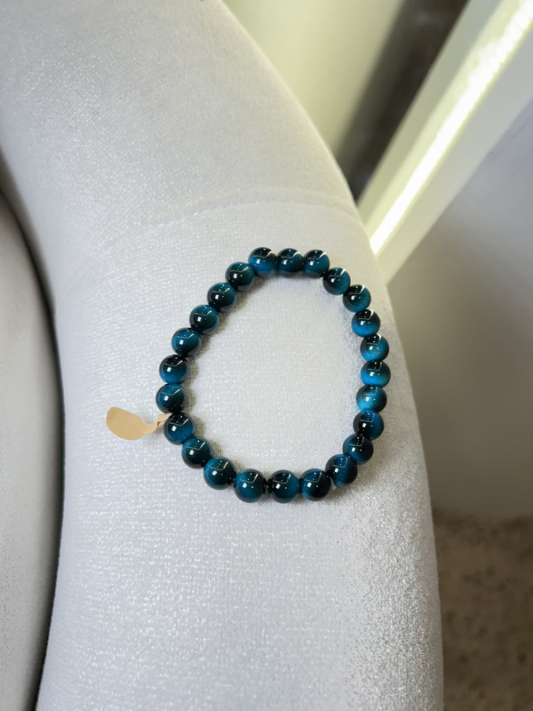 PULSERA DE PIEDRA NEGRA CON AZUL